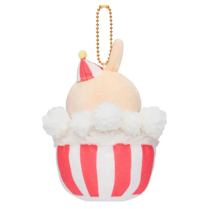 Rear view of beige bunny plush keychain with orange bead necklace and striped cupcake body
