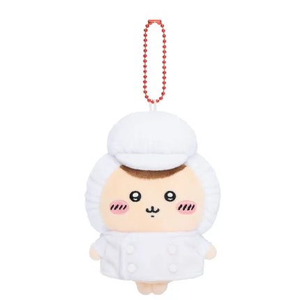 White plush mascot keychain with red beaded necklace, front view in white chef coat