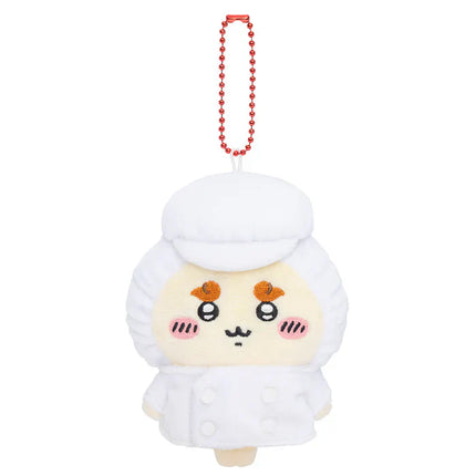 White plush mascot keychain with red beaded necklace, smiling face with orange blush