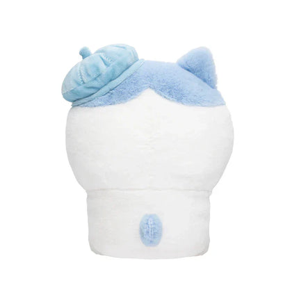 Back view of white sitting plush toy with blue ear muffs