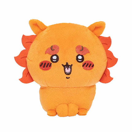 Orange cat-like plush toy with smiling face and red side tufts.
