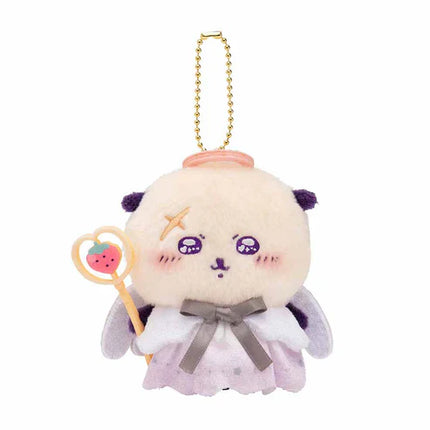 White plush mascot keychain with purple face markings, heart wand, winged outfit, gold chain.