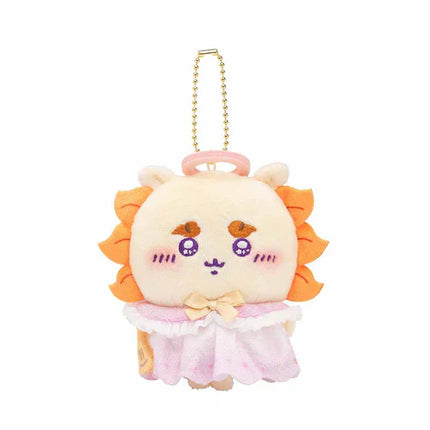 White plush mascot keychain with orange spiky hair, pink ruffle dress, gold chain strap.