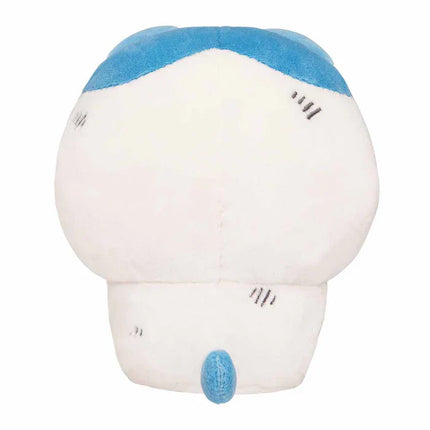 White-and-blue plush toy with stitched face and blue cap