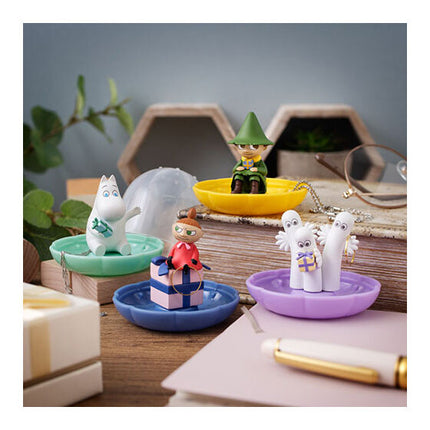 Miniature display cases set with four Moomin Gemlies character figures on colored bases