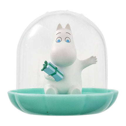Moomin Gemlies figure in clear dome, white character holding green tool, teal base