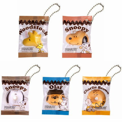 Set of 5 PEANUTS bakery charm keychains with character tags, each on a metal chain
