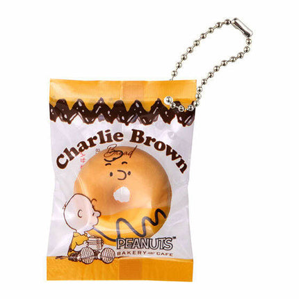 Charlie Brown bakery cafe charm keychain in a small sealed plastic bag with silver ball chain