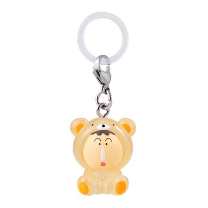 Chibi bear character keychain in cream pajamas with metal ring and white loop