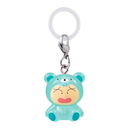Chibi bear character keychain in light turquoise pajamas with metal ring and white loop