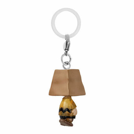 Character keychain charm with tan hat and yellow base, hanging from ring