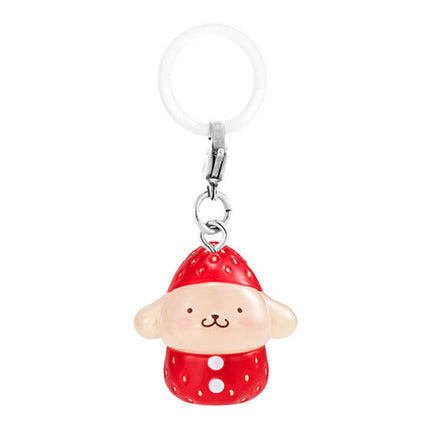 Strawberry-themed bear-like keychain charm with smiling face and red polka-dot outfit