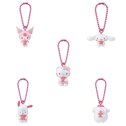 Set of four one-tone mascot keychains with pink bead strings and hanging figures