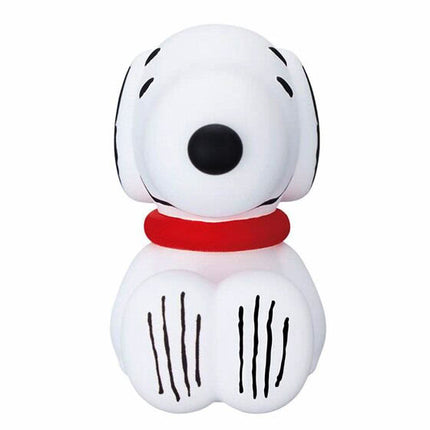 White Snoopy-style capsule figure with red collar and black line marks on body.