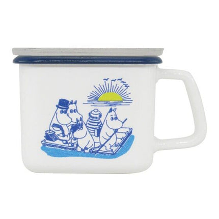 Small white enamel pot with dark blue rim, right-side handle, and blue characters