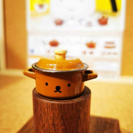 Orange miniature miffy Boris-face cooking pot with black lid and side handles