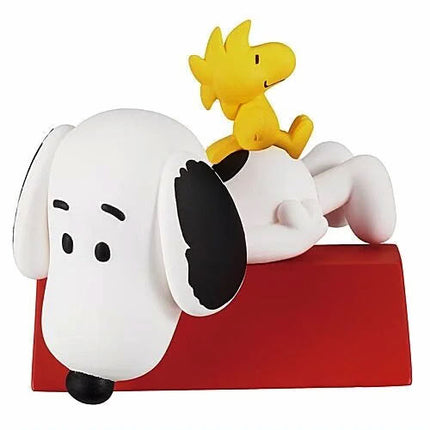 Snoopy on a red base with yellow Woodstock above, black ear details