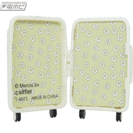 Open mini suitcase pair showing pale green floral pattern and rolling wheels