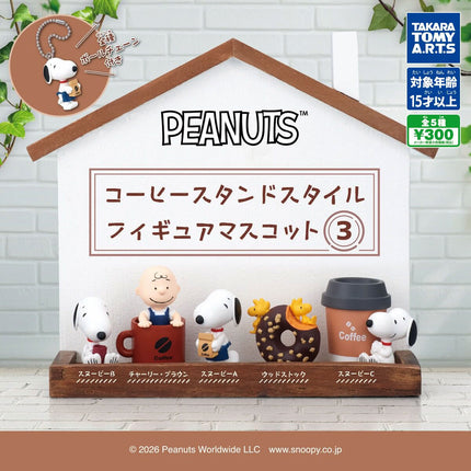 Peanuts Snoopy coffee stand keychain figures set on display base, with cups and charms
