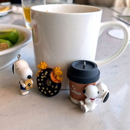 Coffee-themed Snoopy keychain set with 5 small figures and cup accessories
