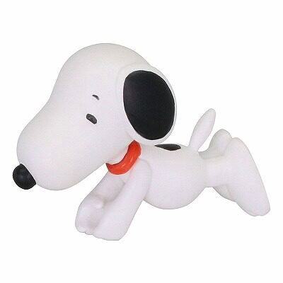 Snoopy mascot figurine with one paw raised, wearing a red collar