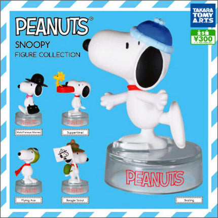 Peanuts Snoopy figure in white outfit with blue cap, standing on round "PEANUTS" base