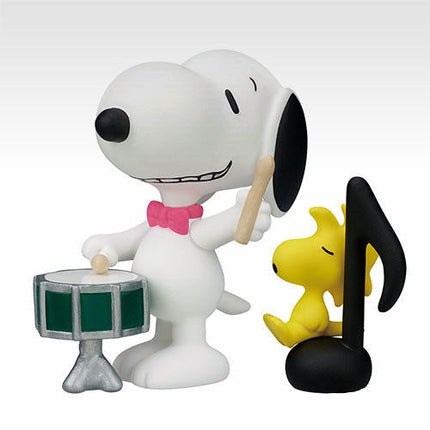 Snoopy drum miniature figure with painted drum, pink bow, yellow flame