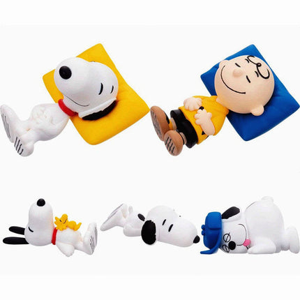 Snoopy and friends capsule mascot figures set, lying on pillows