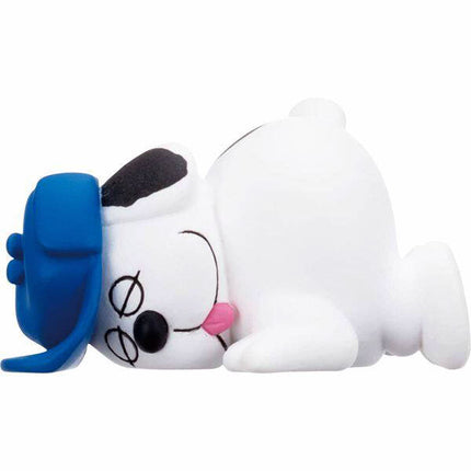 Snoopy capsule mascot figure with blue blanket and closed eyes, pink tongue
