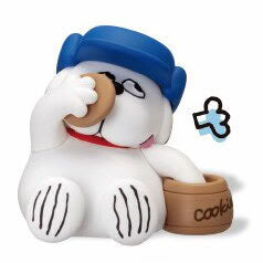 Snoopy hide-and-seek figure with blue cap and “cook” bowl, seated pose