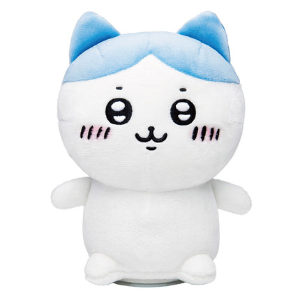 White plush cat toy with light-blue ears and big round eyes, standing