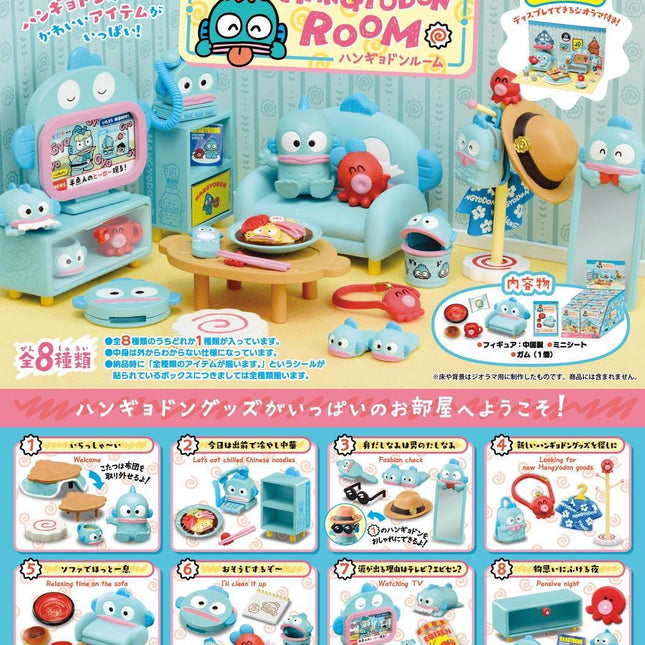 Miniature dollhouse room set with blue sofa, table, cute characters, and small accessories