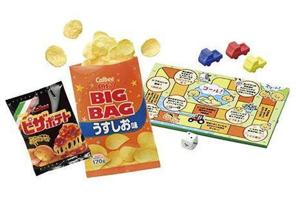 a bag of chips, a game board, and some dice, all of which appear to be part of a snack and board game set.
