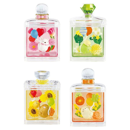 four glass bottles with colorful designs and illustrations on their surfaces.