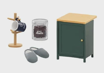 a variety of objects, including a mug, a jar, a pair of slippers, and a green cabinet.