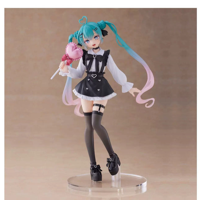 Teal-haired anime fashion figure with black dress, white sleeves, holding pink heart prop