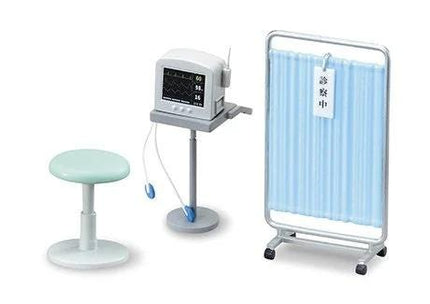 a medical device, including a monitor, a stool, and a curtain.