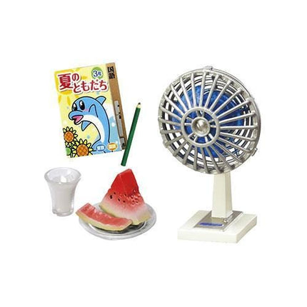 a toy fan, a watermelon slice, a pencil, and a juice box.
