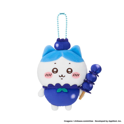 Plush pocket fruit mascot keychain, blue outfit with pom-pom accents and beaded strap