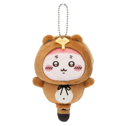 Brown tanuki plush keychain with yellow emblem, stitched face, silver ball chain