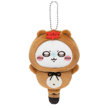 Brown tanuki plush keychain with red emblem, stitched face, silver ball chain