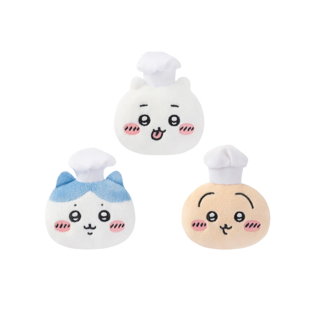 Three plush chef face badges: white, blue, and beige chef hats