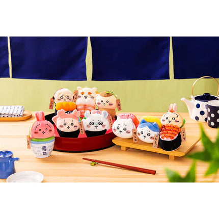 Sushi mascot plush keychain group display with small animal faces and charm tags