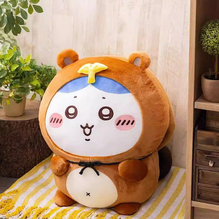 Tanuki series plush toy, round brown character with blue cap, white face and black bow