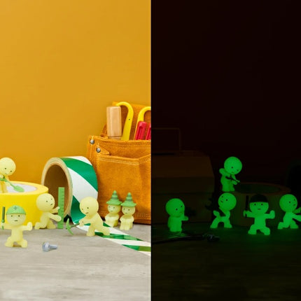 Smiski Construction Series blind box figure with green-striped hard hat and shovel