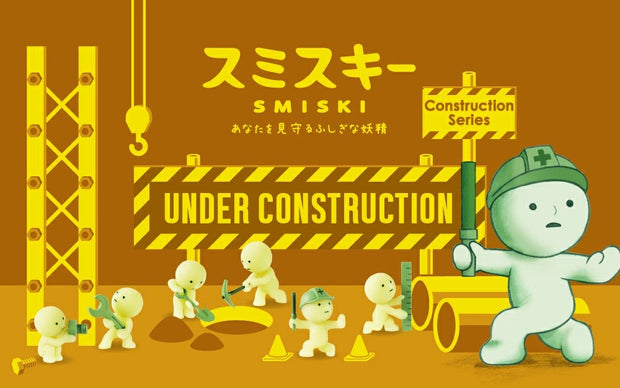 Smiski Construction Series blind box under construction display with green character