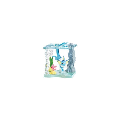A toy aquarium with a blue and green color scheme, featuring a small fish-like creature and various aquatic elements such as plants and rocks.