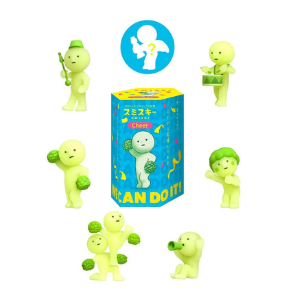 a collection of seven small, glowing green figurines arranged in a circular pattern. The figurines appear to be anthropomorphic, with one holding a guitar and another holding a drum. The figurines are set against a blue background, and there is a large blue box with yellow and white text in the center of the image.