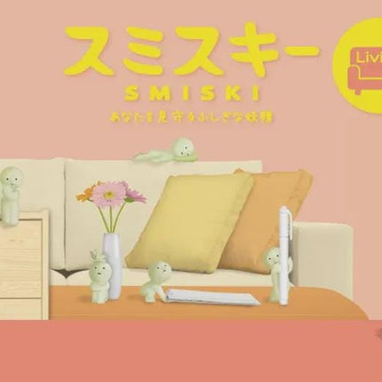 The image is a collage of various objects, including a cat, a couch, a vase, and other small figurines, all set against a pink background.