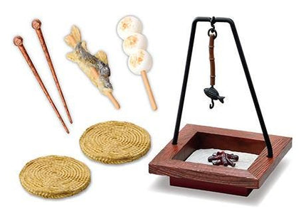 various objects, including a wooden tray, a pair of chopsticks, a small fish, and a small wooden bowl.